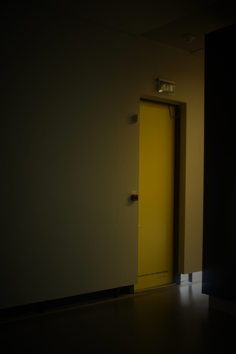 closed, wall - building feature, built structure, ceiling, yellow, dark, empty, no people, building, door, illuminated, mistery, domestic room, security