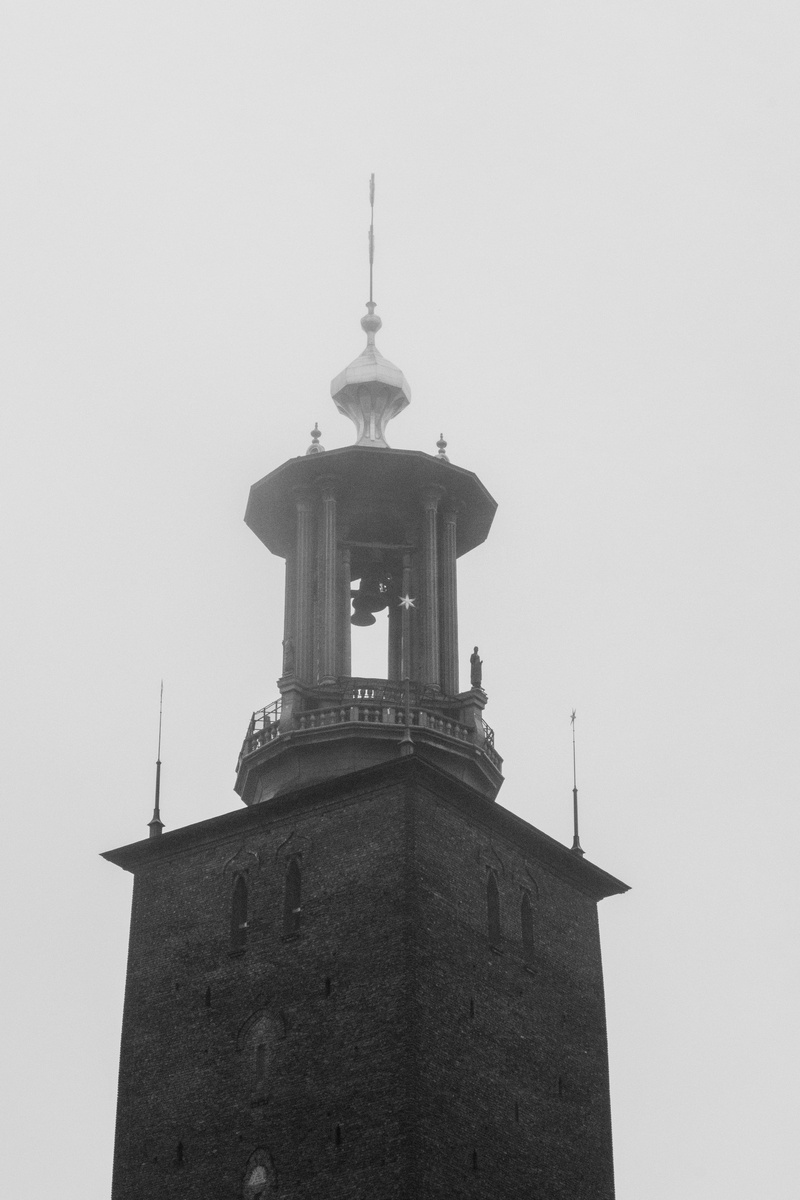 tall - high, stadshus, architecture, copy space, black, the past, day, spire, clear sky, fog, stockholm, sky, high section, white, tower, nature, low angle view