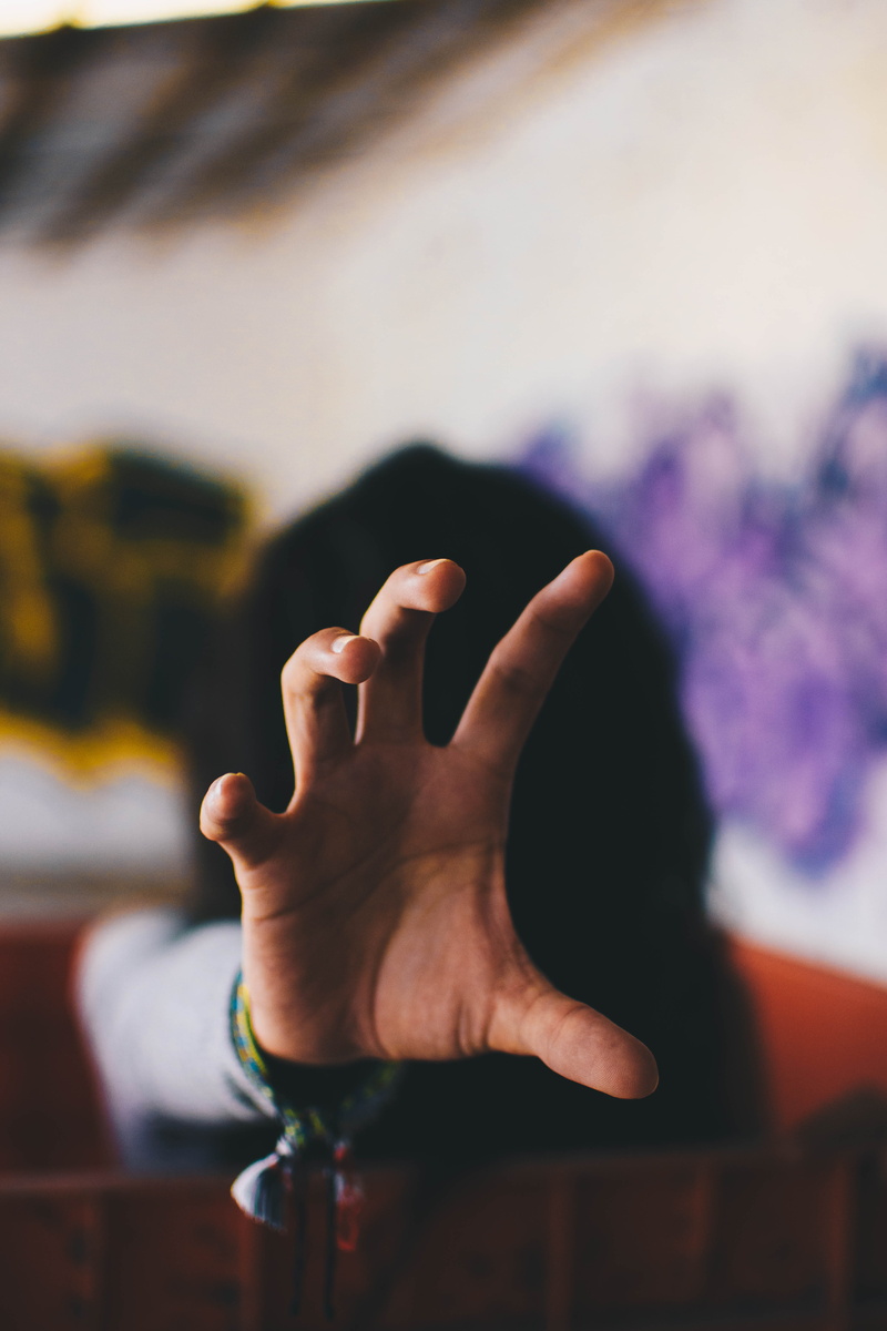 hand, mistery, lifestyles, indoors, finger, body part, leisure activity, real people, close-up, grafitti, relaxation, tones, strange, adult, unrecognizable person