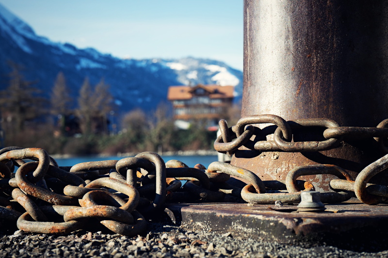 interlaken, security, close-up, city, sunlight, connection, mountains, sky, nature, snow, iron - metal, building exterior, iron, switzerland, building