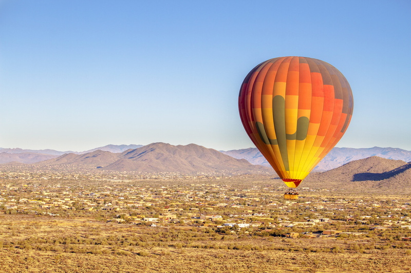 environment, red, land, community, nature, blue, arizona, scenics - nature, mid-air, air vehicle, phoenix, climate, transportation, adventure, no people