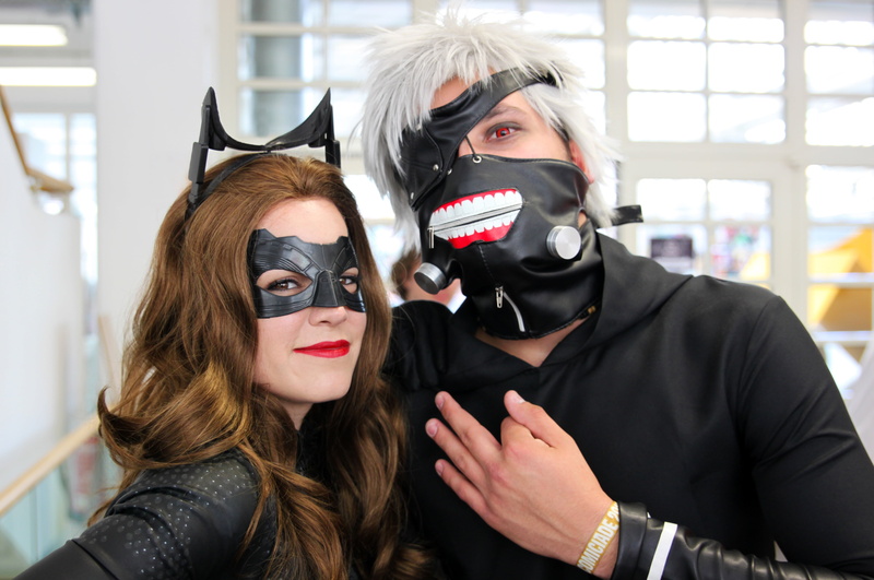 mythical creatures, panel, indoors, focus on foreground, disguise, kenkaneki, 4K, catwoman, costplay, anime, fair, convention, dress up, looking at camera