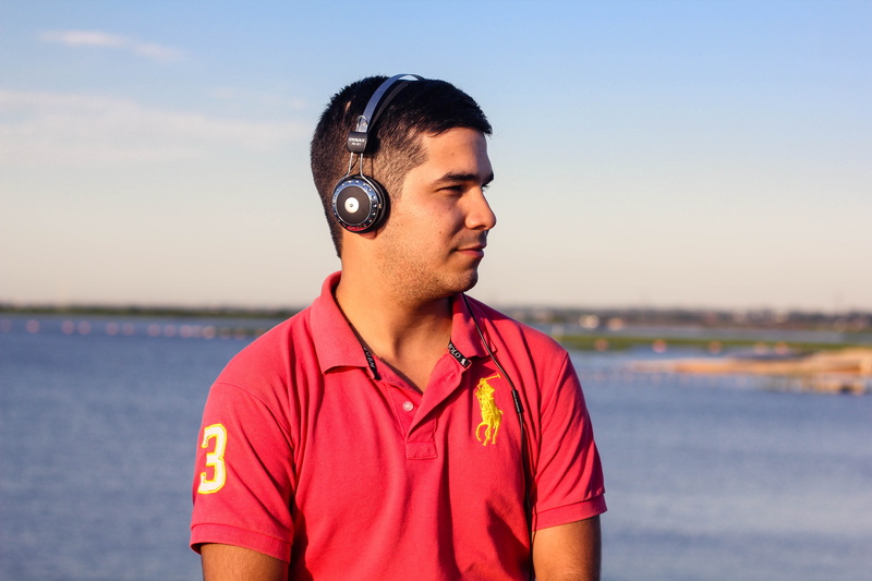 sad, leisure activity, one person, solitary, music, headshot, focus on foreground, front view, portrait, nature, outdoors, headphones, casual clothing