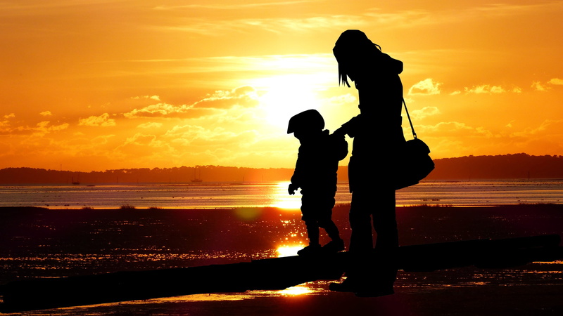 scenics - nature, orange color, woman, sky, real people, side, leisure activity, positive emotion, nature, togetherness, child, cloud - sky, sunset, water