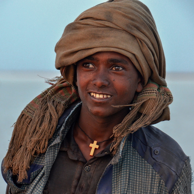 one person, close-up, sky, day, ethiopia, young adult, young women, leisure activity, adult, people, looking at camera, lifestyles, smiling, lac karum