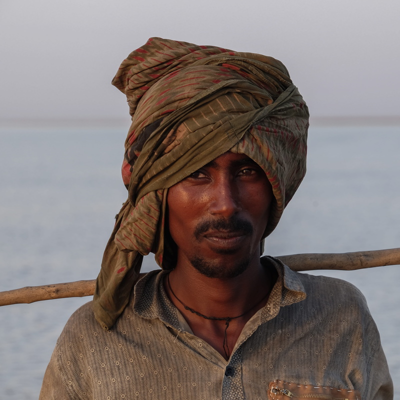 front view, danakil, people, lifestyles, young men, headshot, males, portrait, looking at camera, clothing, real people, water, beard, ethiopia, lake karum