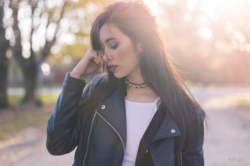 adult, front view, one person, hairstyle, long hair, leather jackets, portrait, beautiful woman, focus on foreground, hair, lifestyles, looking, telephone