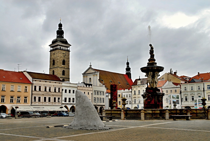 the past, recession, city, incidental people, travel destinations, cloud - sky, history, square, black tower, building, belief, fountain, clock, place of worship