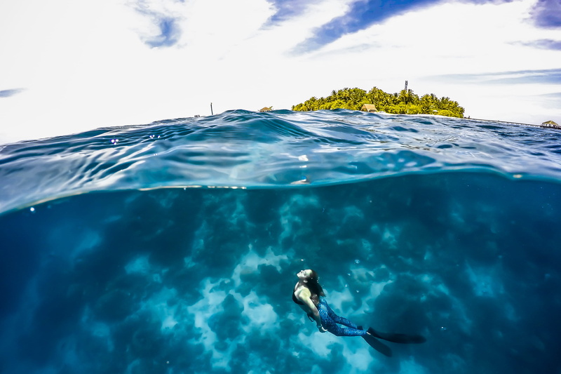 lifestyles, swimming, sky, sports, sea life, nature, person, human, leisure activity, one person, day, water, reef, diving, blue, adventure, island, beauty in nature