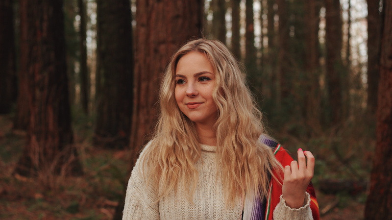 selective, looking at camera, 5K, warm clothing, lifestyles, blond hair, focus, clothing, female, adult, long sleeve, plant, portrait, hair, land, woodland