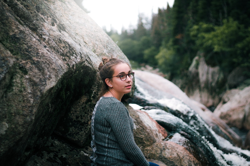 one person, forest, casual clothing, day, looking away, sitting, beautiful woman, young women, solid, 5K, young adult, leisure activity, standing, waterfalls