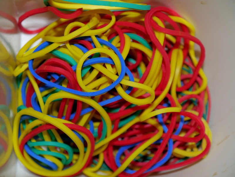 choice, abundance, electrical equipment, connection, office, complexity, rubber, blue, no people, table, tangled, multi colored, still life, rubber band