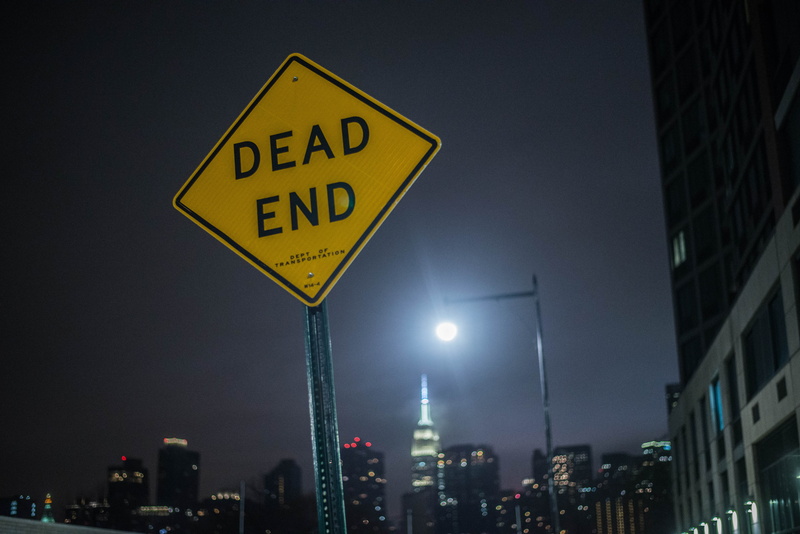 building, tarmac, symbol, safety, light, town, no people, way, sign, street, dead end, stopsign, road sign, direction, metropolis, road, 5K, city, text