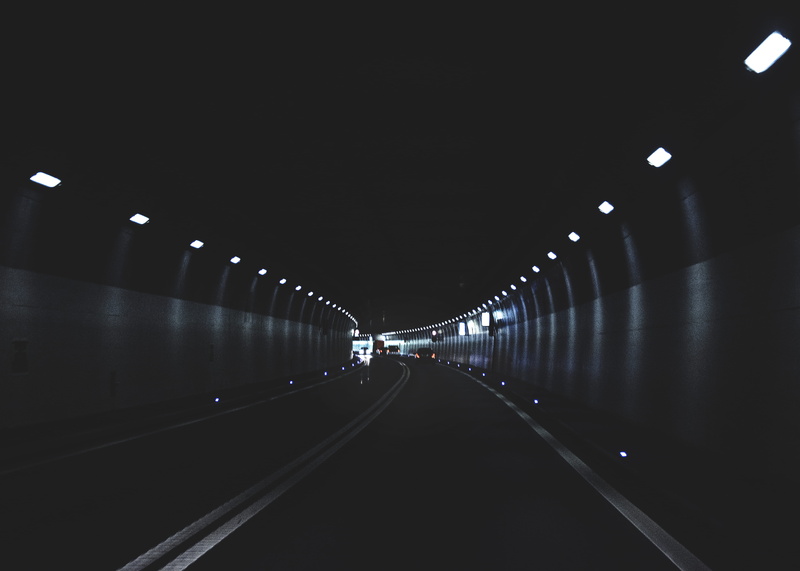 vanishing point, indoors, no people, dark, light, footpath, transportation, long, built structure, rail transportation, in a row, subway, tunnel, empty