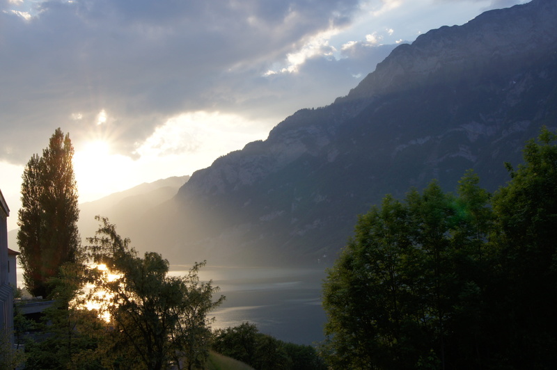 no people, clouds, sunset, tranquil scene, beauty in nature, tree, cloud - sky, mountains, lake, sun, scenics - nature, light, non-urban scene, night, sunlight