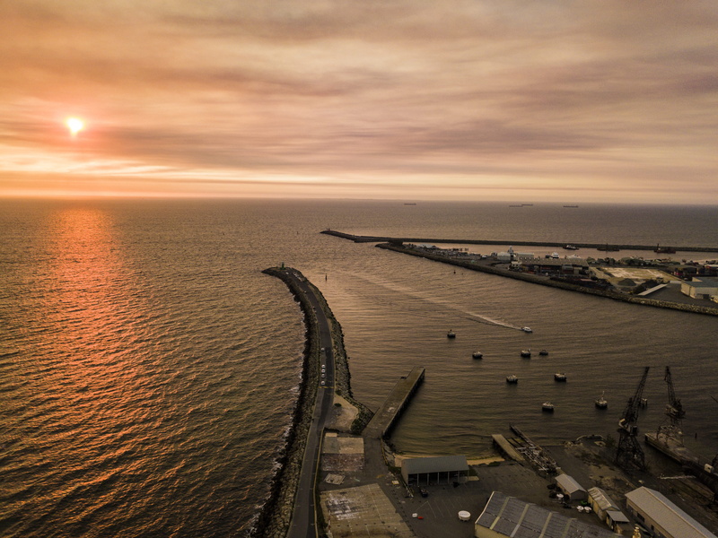 sea shore, orange sunset, cloud - sky, boat, sea side, transportation, outdoors, environment, horizon, pier, sea, scenics - nature, nature, drone sunset