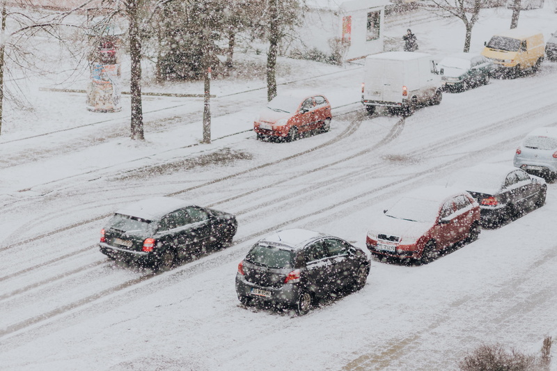 town, mode of transportation, nature, street, extreme weather, car, no people, cold temperature, snow, day, high angle view, city, motor vehicle, tree