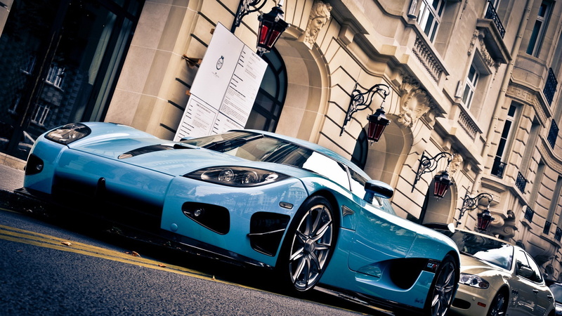blue cars, Koenigsegg CCX, transportation, city, sunlight, outdoors, mode of transportation, architecture, street, land vehicle, vintage car, day, building