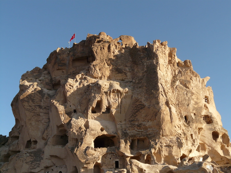 rock, land, low angle view, no people, nevşehir, built structure, day, sky, outdoors, rock - object, ancient civilization, castle rock, tuff stone dwellings