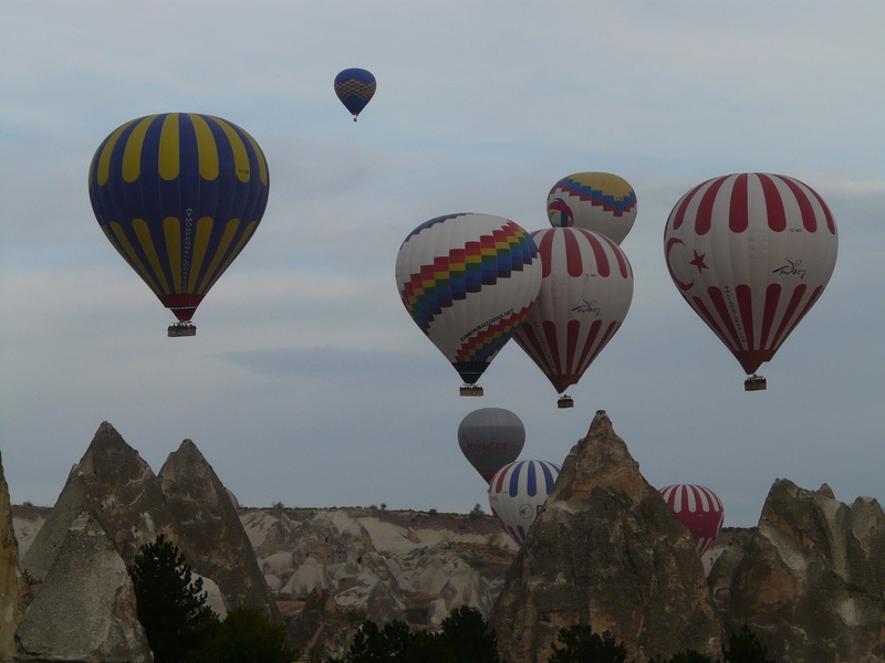 nevşehir, unesco world heritage, turkey, beauty in nature, ballooning festival, day, travel, world heritage site, mountain, dusty, balloon, outdoors, hot air balloon ride