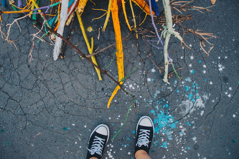 human limb, foot, low, paper, one person, diversity, colors, human, footwear, sneakers, top, personal perspective, confetti, pov, apparel, day, high angle view