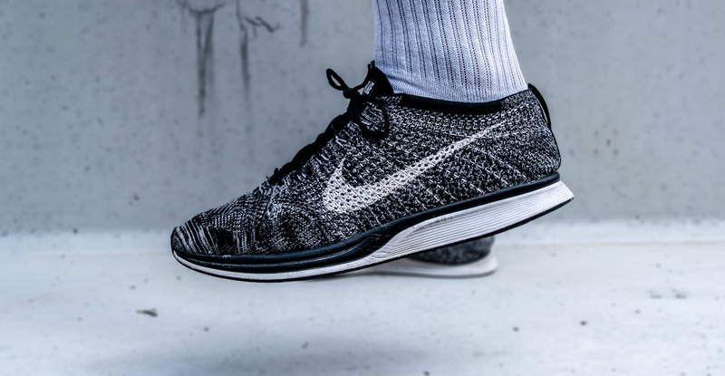 black, fashion, person, 2K, high heels, footwear, flyknit racer, womenswear, clothing, nike, shoe, top, human body part, one person, casual clothing, wearing