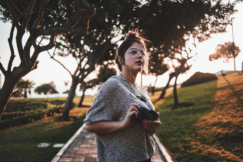 black, photographer, outdoors, hairstyle, lifestyles, style, photography, daytime, casual clothing, tree, 5K, woman, nature, one person, adult, young women