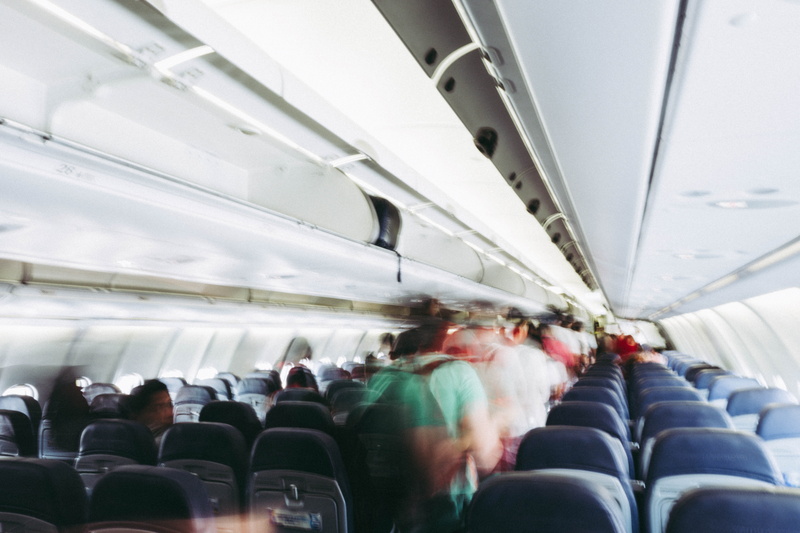 real people, mode of transportation, interior, lapse, walking, travel, time, passenger, large group of people, airplane seat, ceiling, crowd, adult, departing