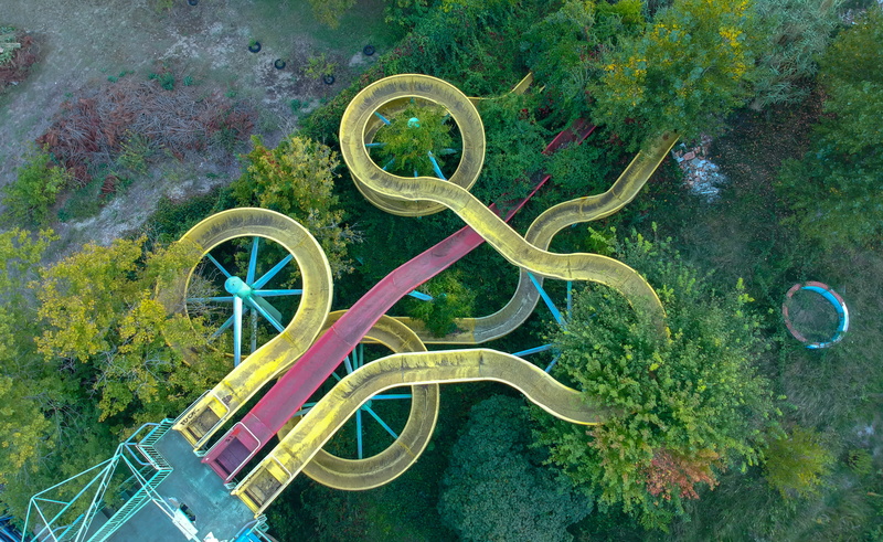 slides, italy, ruine, acquapark, metal, dji, outdoors, geometric shape, daytime, lake, no people, cervia, curve, multi colored, land, high angle view, nature