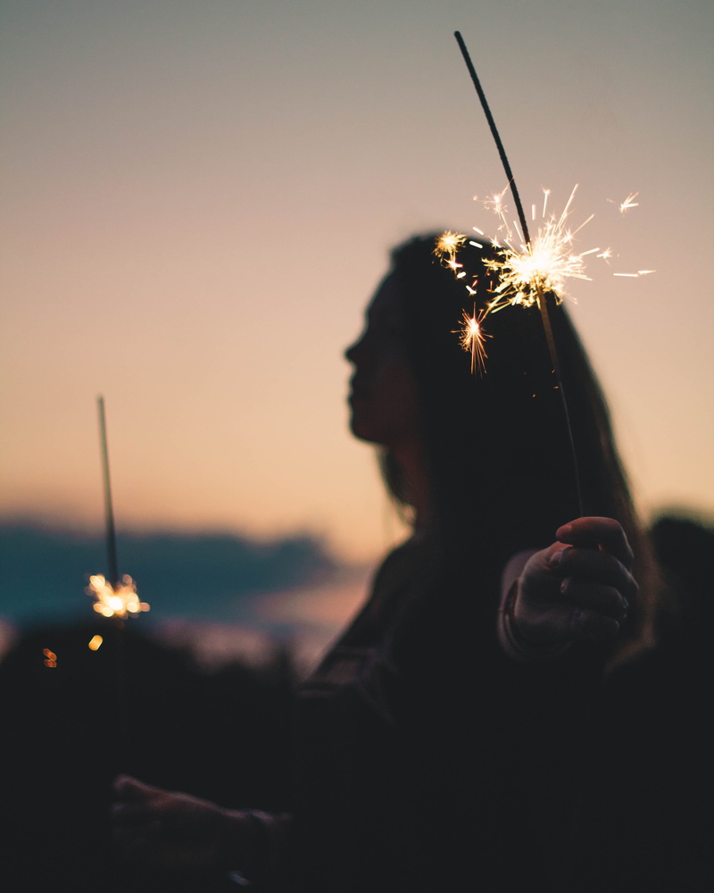 sparks, illuminated, raw, portrait, sky, art, headshot, real people, focus on foreground, 4K, sparklers, lifestyles, holding, girl, happy, woman, leisure activity