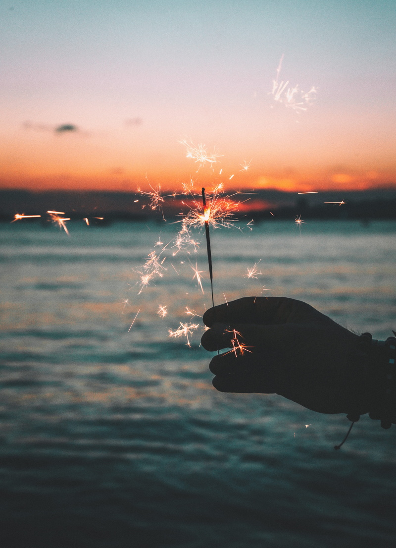 lifestyles, dawn, sunset, dusk, lake, nature, scenics - nature, 5K, sea, human hand, sky, travel, sparks, outdoors, one person, orange color, ocean, landscape
