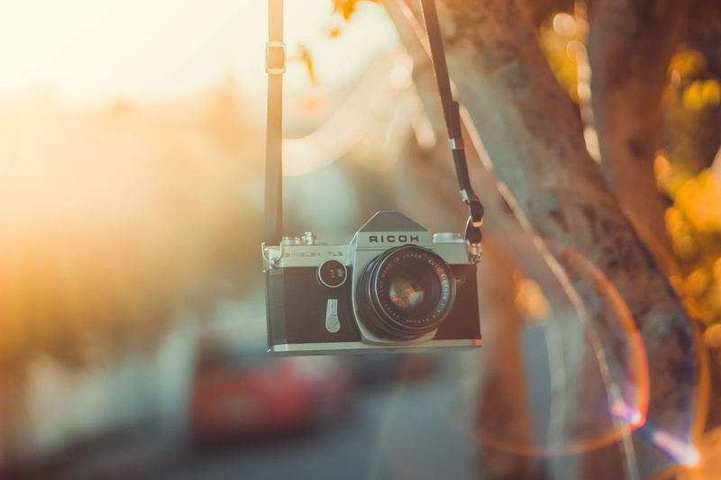 instrument, cars, digital camera, focus on foreground, lens, old camera, hanging, photographic equipment, technology, antique, camera lens, indoors, day