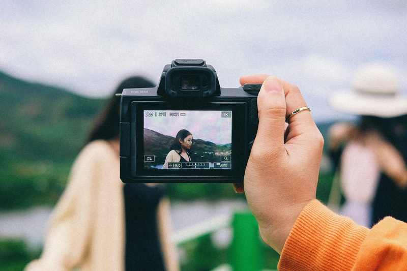 mockup, human hand, focus on foreground, video camera, hand, focus, person, photographer, wireless technology, photography, outdoors, camera - photographic equipment