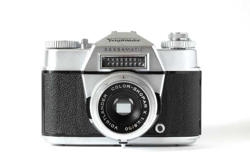 studio shot, cut out, close, black color, antique, indoors, studio, lenses, photographic equipment, chrome, camera, retro, digital camera, retro Styled