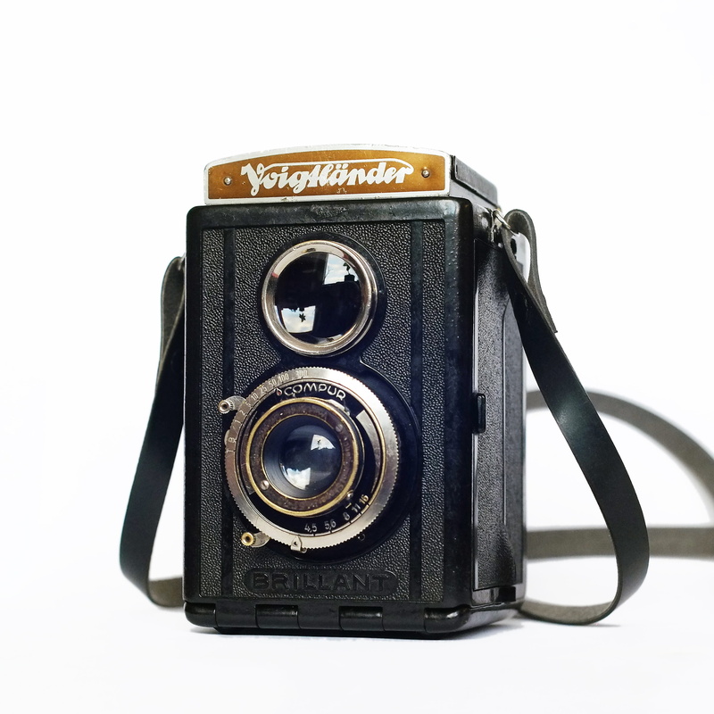 antique, lens, vintage, indoors, machine, close-up, classic, black color, nostalgia, camera - photographic equipment, analog, isolated, tlr, text, white background