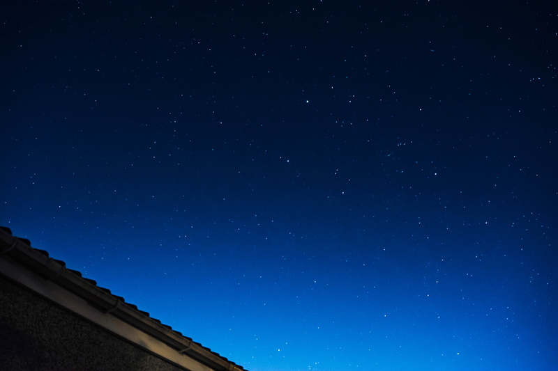 galaxy, beauty in nature, starry, night, exploration, outdoors, tranquility, nature, tranquil scene, space, sky, built structure, moon, low angle view