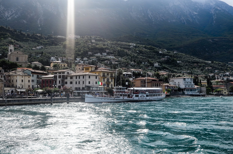 travel destinations, cliffs, water, transportation, no people, sea, garda, tourist destination, travel, building, at malcesine, outdoors, nature, passenger craft