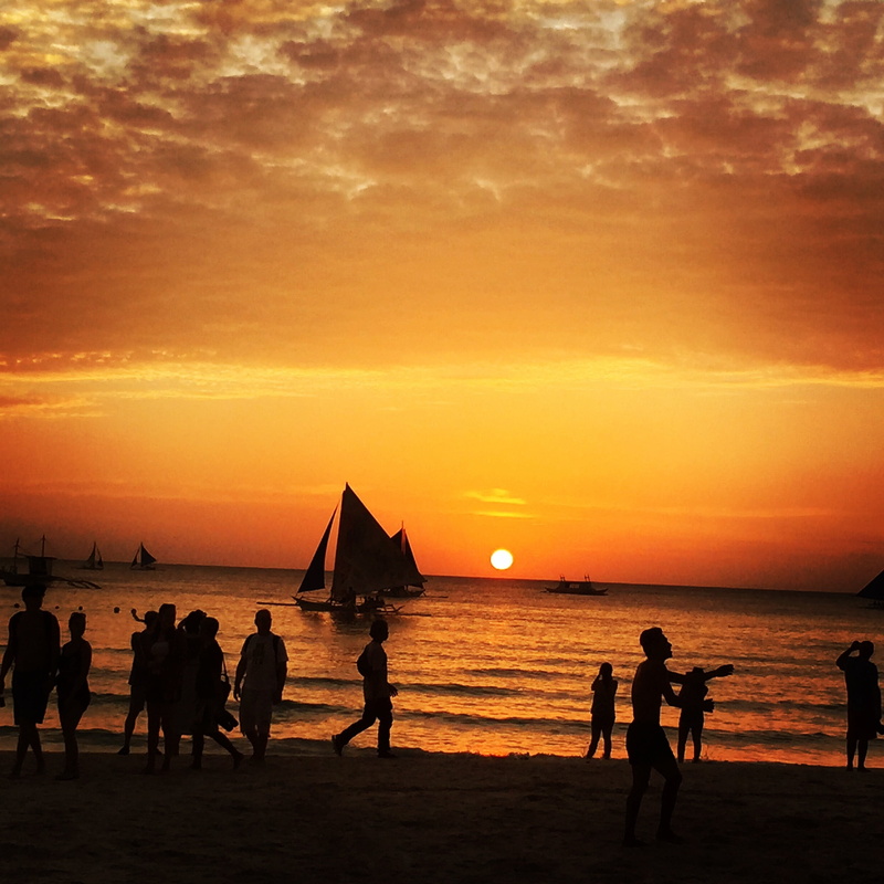 outdoors, land, sky, philippines, cloud - sky, sunset, orange sky, boracay, horizon over water, leisure activity, sun, real people, water, lifestyles, sea