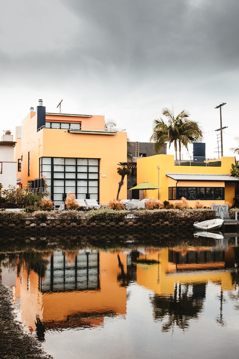reflection, transportation, nature, building exterior, no people, outdoors, office building, tree, yellow, concrete, grey, venice canals, water, palm tree