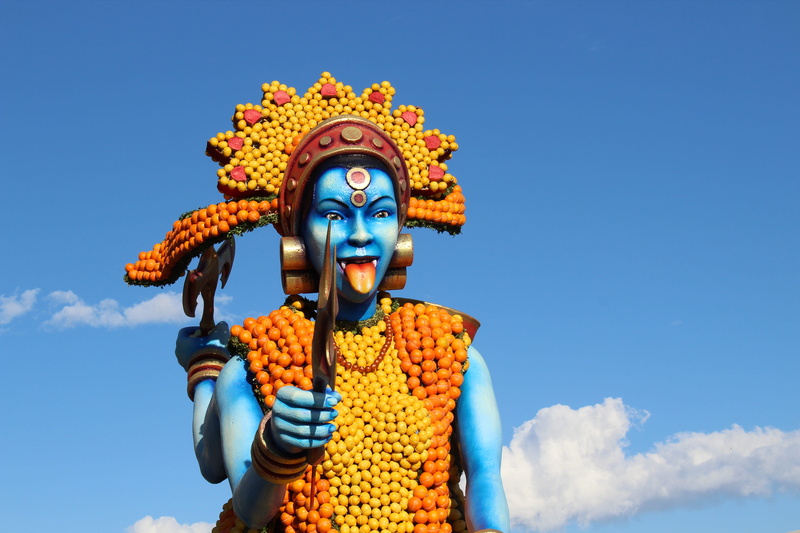 multi colored, sky, event, spirituality, male likeness, cloud - sky, france, nature, chin, low angle view, blue, belief, corso, creativity, travel, menton lemon