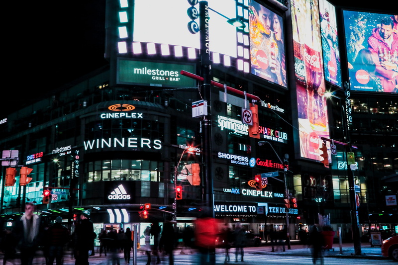travel destinations, non-western script, street, commercial sign, built structure, 5K, group of people, building exterior, text, incidental people, toronto