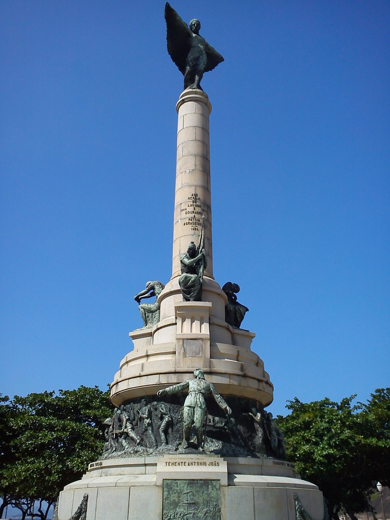 urca, statue, outdoors, architecture, clear sky, monument, no people, art and craft, famous Place, blue, built structure, craft, low angle view, creativity