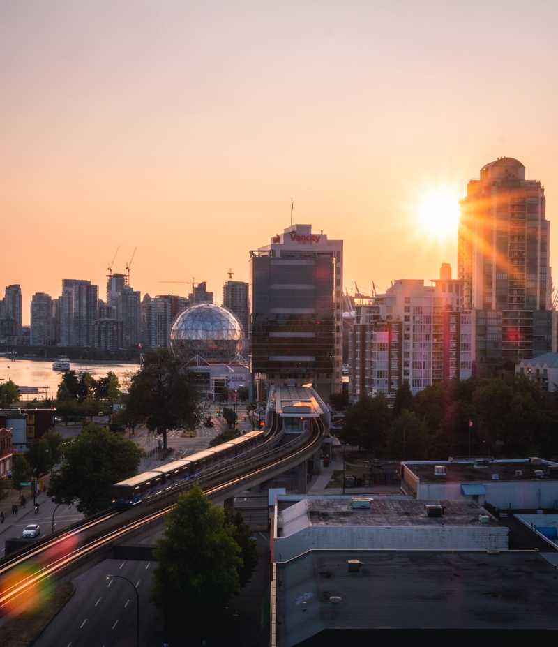 architecture, sunset, sun, 4K, lens flare, train, evening, motion, skyscraper, vancouver, building, road, sky, city street, mode of transportation, canada