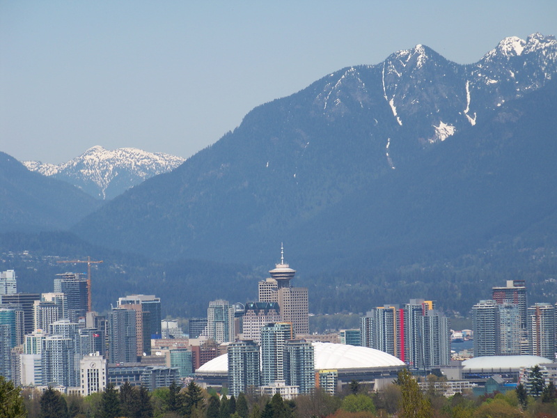 2K, outdoors, downtown, building exterior, scenics - nature, landscape, no people, architecture, mountain, sky, cityscape, mountain peak, city, skyscraper