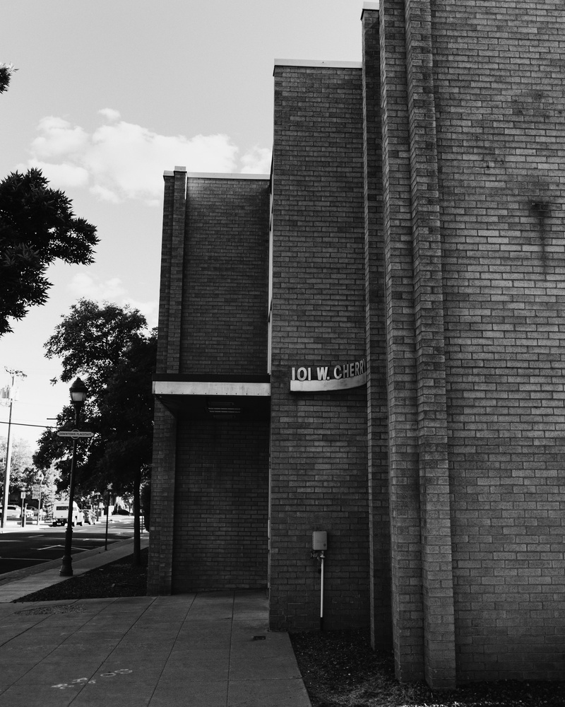 sign, built structure, street, building, street photography, text, architecture, sky, plant, no people, western script, downtown, united states