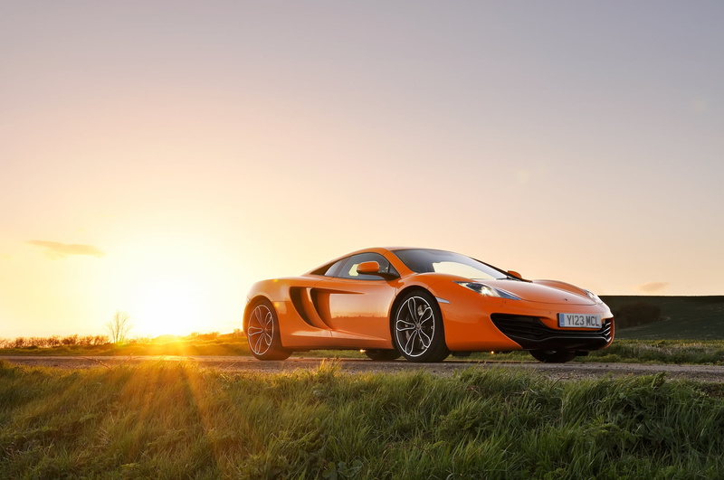 copy space, orange color, land Vehicle, driving, sun, engine, mode of Transport, 1080P, shiny, sky, road, mp4-12c, grass, design, side View, field, speed