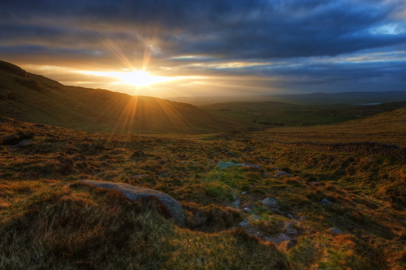 sun, cloud - sky, sunbeam, outdoors, hill, sun flare, non-urban scene, idyllic, dawn, remote, lens flare, trees, sky, clouds, no people, light, landscape