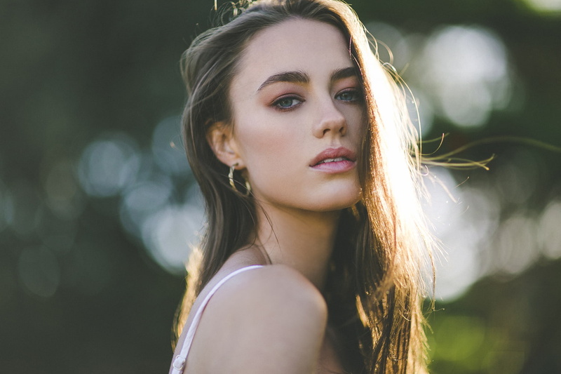 women, model, hoop earrings, beautiful woman, contemplation, portrait, long hair, depth of field, hair, brown hair, beauty, human face, focus on foreground