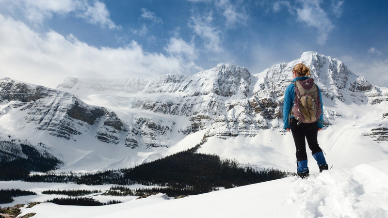 one person, day, leisure activity, clothing, mountains, 1080P, hiking, real people, scenics - nature, sky, standing, extreme weather, snowfield, warm clothing