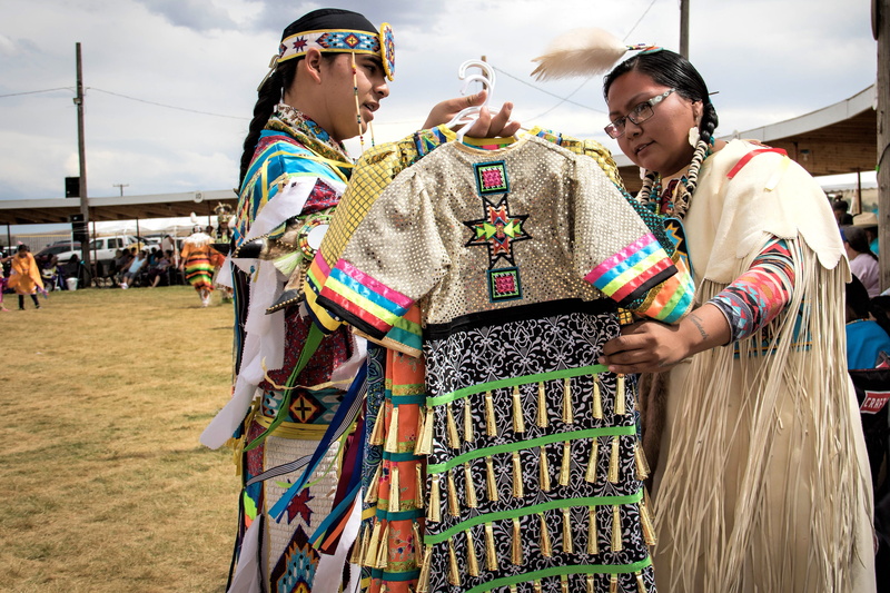 wyoming, dancing, summer, cultures, outdoors, indigenous Culture, three quarter length, adult, front view, american native, traditional, multi colored